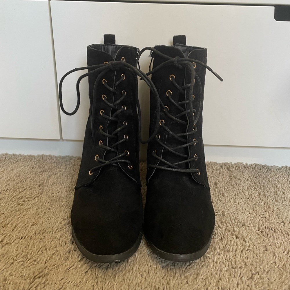 Black laced and zip up boots